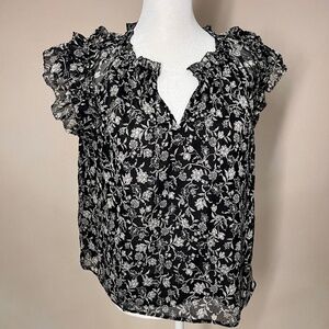 Black and white floral sleeveless blouse